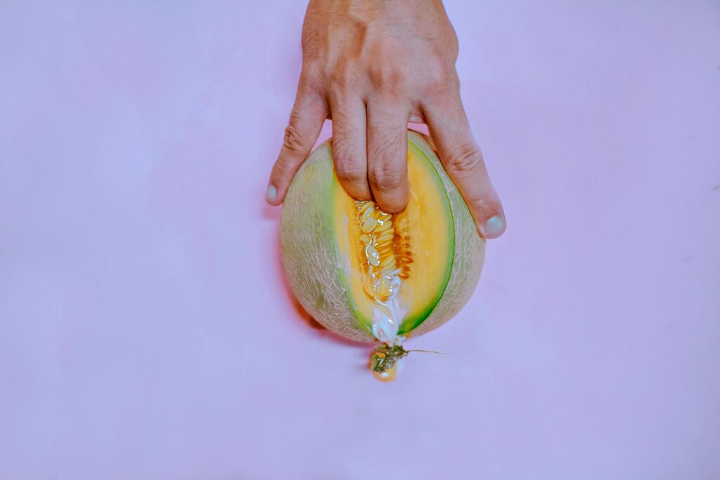 fingers on melon