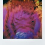 polaroid photo of overlaid portraits